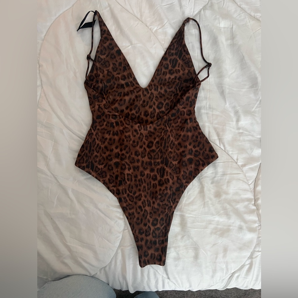 Ark swim wear one piece leopard size sm/med